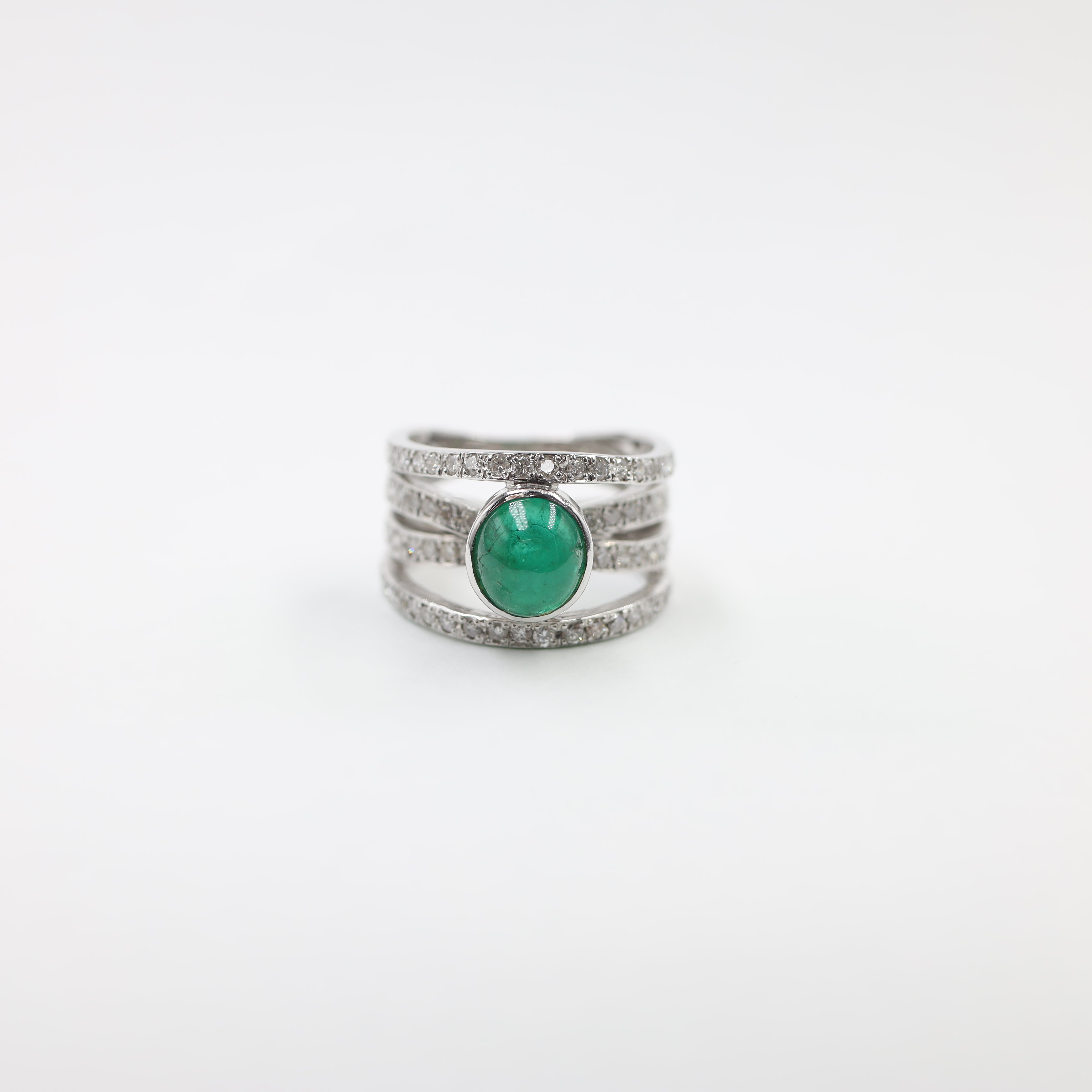 Platinum ring with emerald center piece