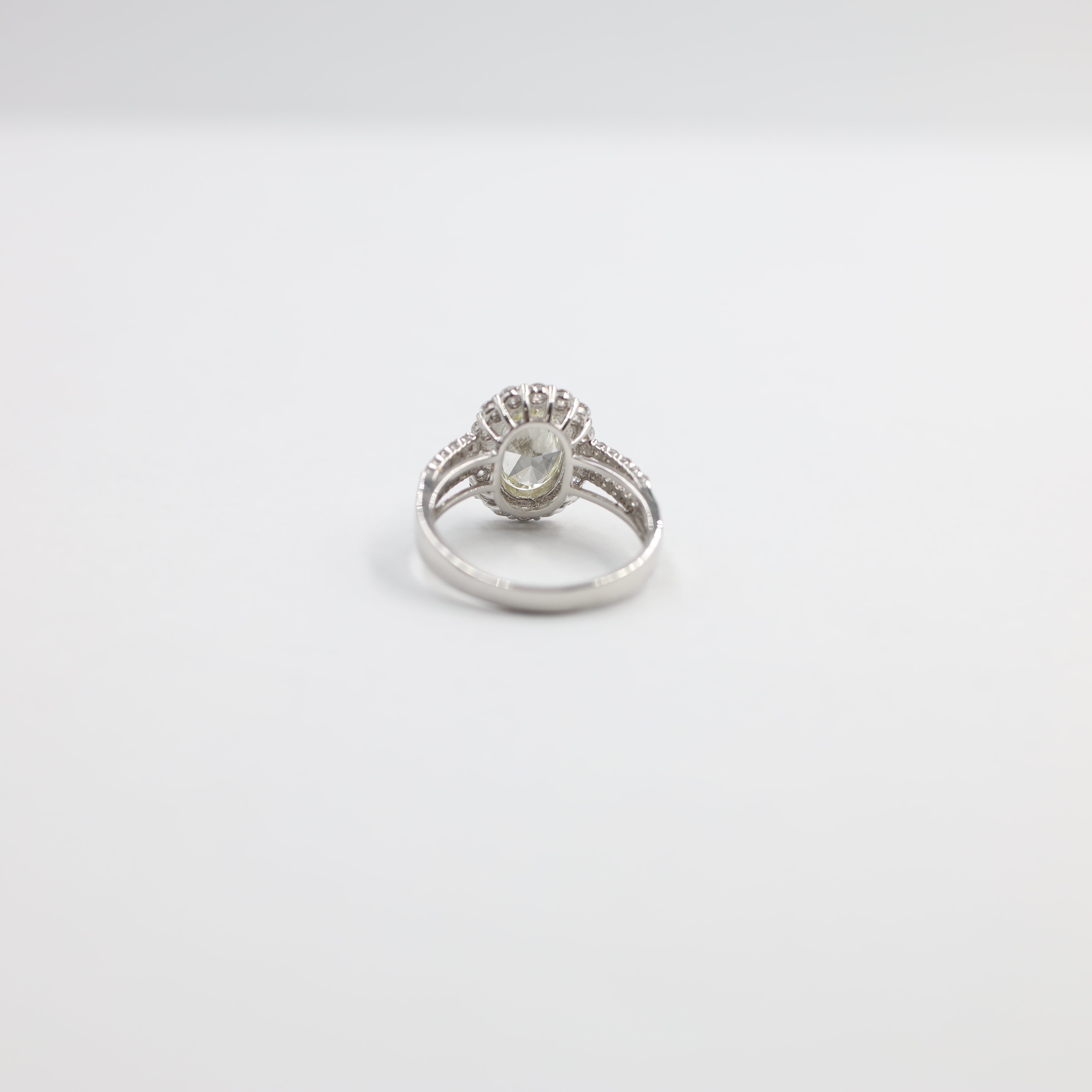 Stunning Platinum Oval Diamond Halo Engagement Ring