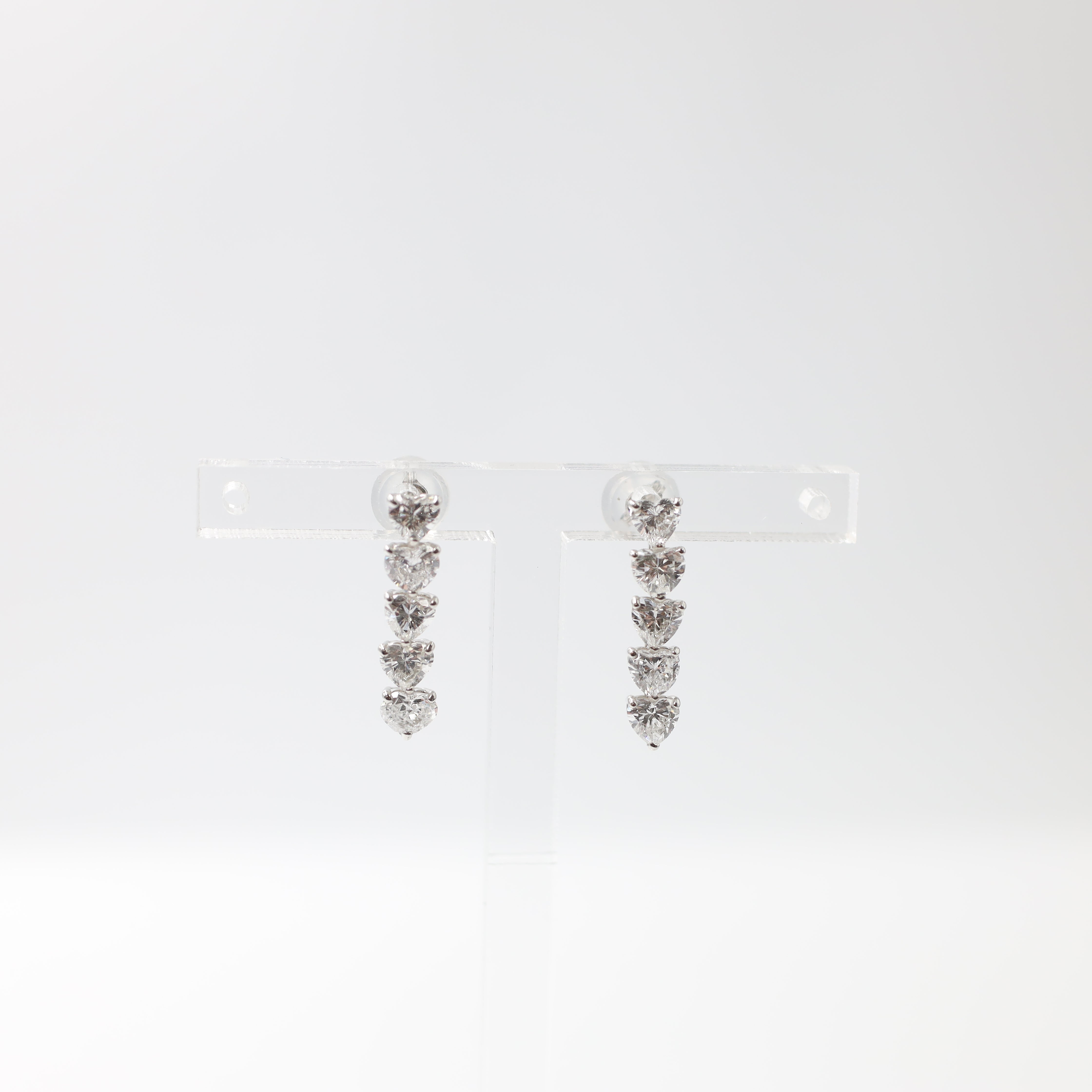Platinum Heart-Shaped Diamond Dangle Earrings (1.47 Carat Total Weight)