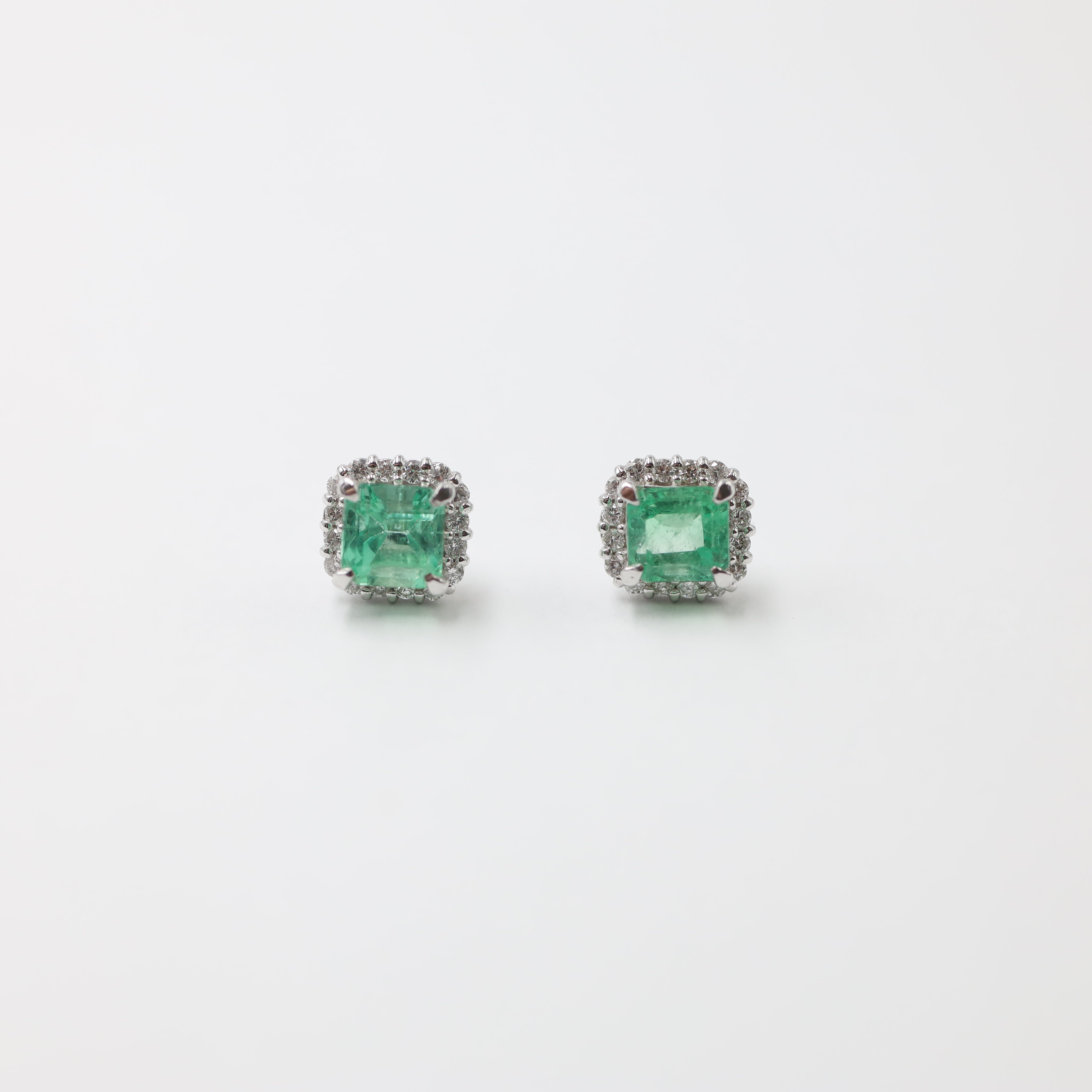 Colombian Emerald and Diamond Halo Stud Earrings in Platinum (1.22 ctw Emerald)