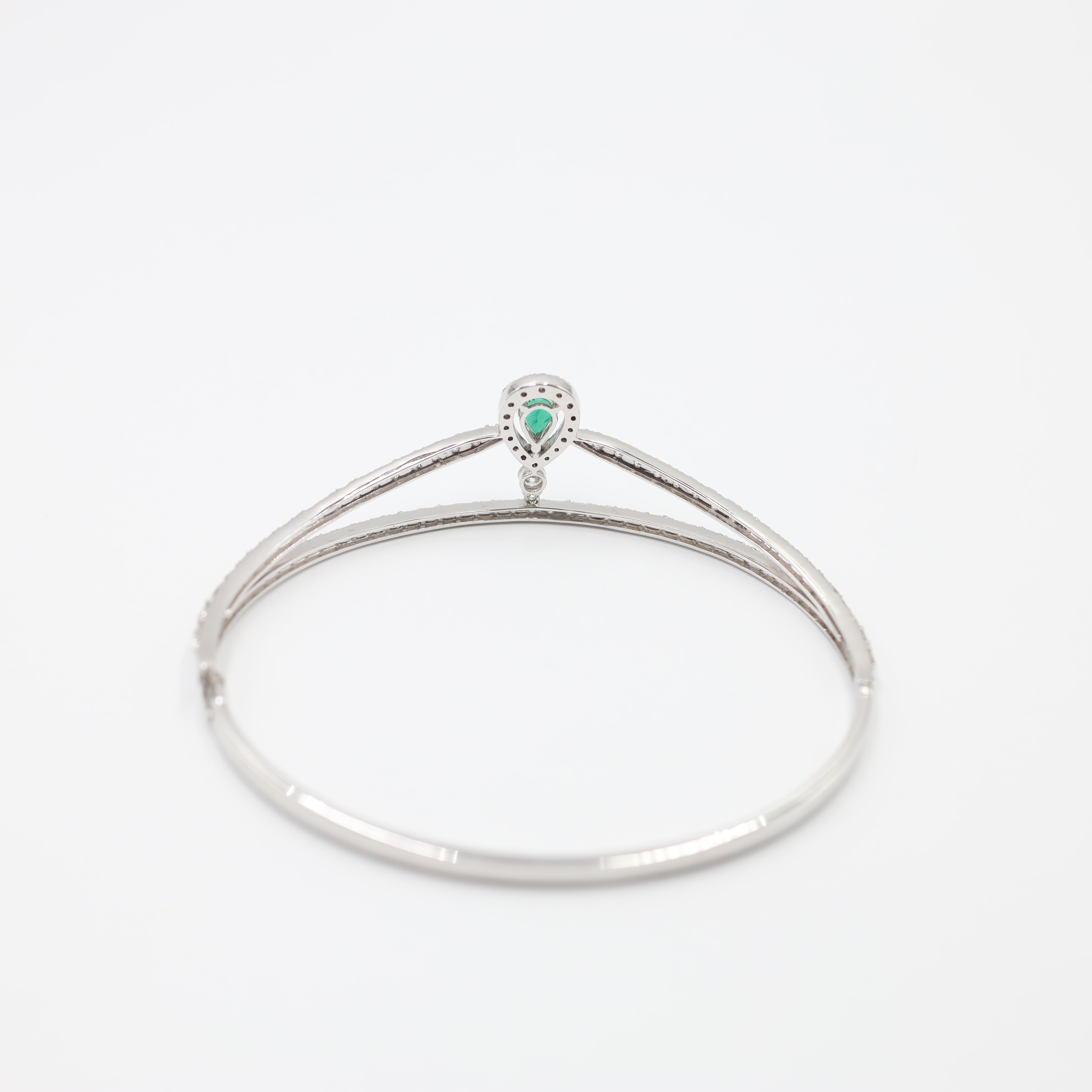 K18 White Gold Emerald and Diamond Crossover Bangle