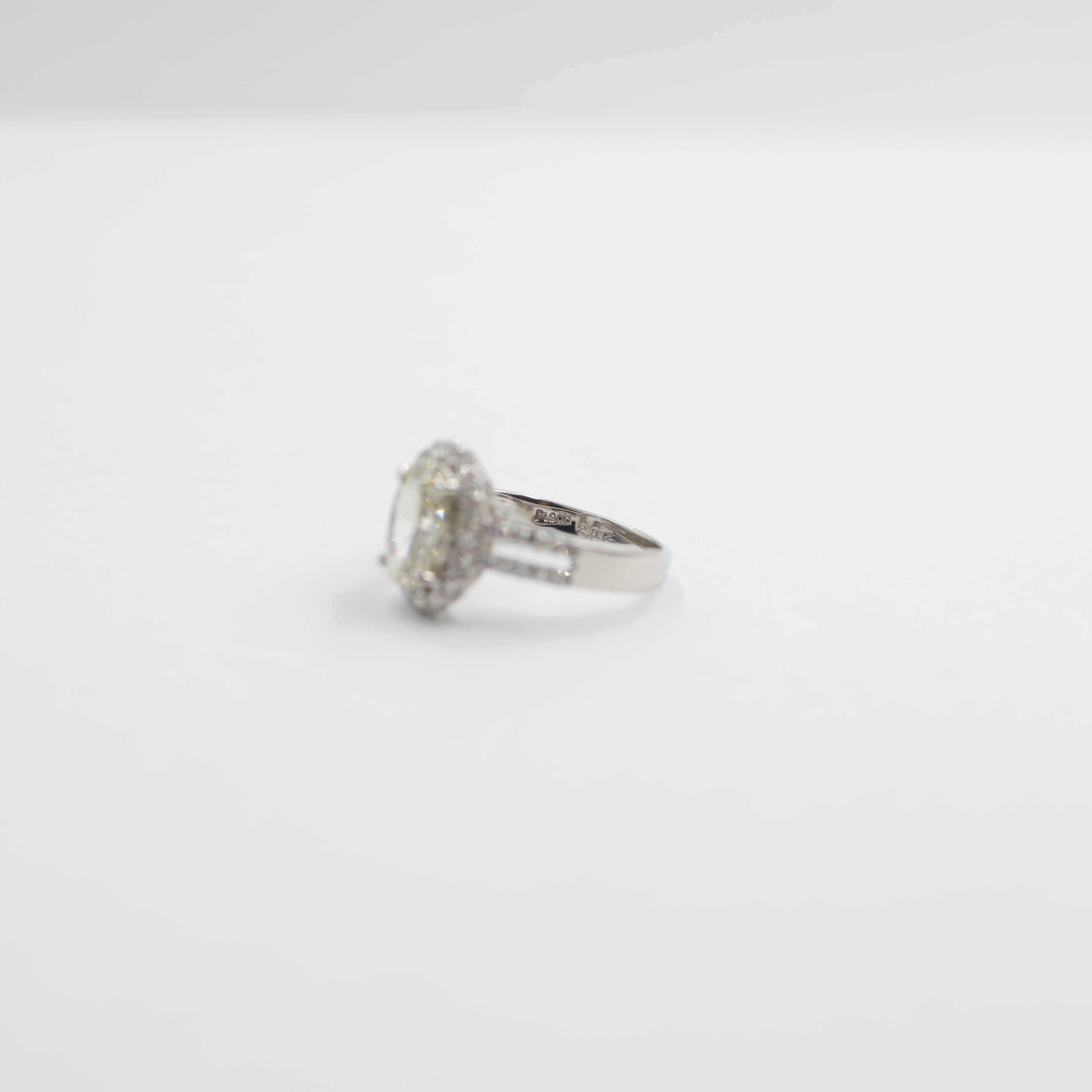 Stunning Platinum Oval Diamond Halo Engagement Ring